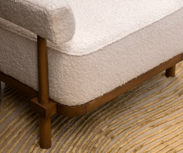 The Cairo subverts typical arm chair expectations by featuring a full-figured tight seat, a curved floating back and an intricate wood frame.